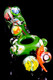 Front bowl view of small garden critters spoon for retail smoke gear, 4.5" green glass with butterfly-style accent and colorful flower marbles.