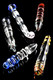 Assorted US-made large glass adult toys, 6–8", mixed colors and textures on black background, wholesale front angle.