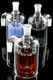 14.5 mm 90° glass ash catcher with 11-arm tree perc, frosted joints, amber/blue/green accents, head-shop supply, front three-quarter studio view.
