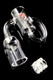 Close-up of clear glass terpcycler recycler banger and gear insert on black background, wholesale head-shop supply, detail view highlighting return loop.