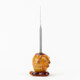 Side profile of amber beehive dab tool showing drip detail and slender metal shaft; 4" accessory for B2B concentrate counters, clean white backdrop.