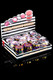 Shelf-ready display of twelve 1.5-in rainbow Ninja metal grinders in retail box; bulk counter set for smoke-shop merchandising.