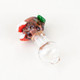 Top-down macro of Hootie Puffco Peak Pro ball cap; brown owl head with blue eye, green accent and red/pink talons on clear borosilicate for wholesale buyers. Top-down macro of Hootie Puffco Peak Pro ball cap; brown owl head with blue eye, green accent and red/pink talons on clear borosilicate for wholesale buyers.