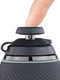 Black Joystick Cap in use on Proxy device, finger showing fidget-friendly control; close-up product demo for wholesale catalog.