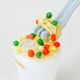 Close detail showing gray fork wrapped with noodles, red/green “veggies,” and 14.5 mm joint opening; retail smoke gear macro on white.
