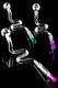 8.5" clear glass snake oil burner pipes with green and purple crystal filter tips on black, angled top view—wholesale head-shop photo.
