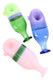Trio of 5" neon flask-shaped glass spoon pipes for wholesale buyers, green, blue, and pink color-blocked bodies with pedestal ends, top-down studio angle.