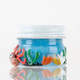 Wholesale Under the Sea terp jar side view, blue glass body, white lid, multicolor coral lampwork on white background.