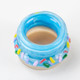 Retail smoke gear mini donut terp jar, top view of open 1.5-inch blue glass container encircled by raised candy sprinkles for airtight concentrate storage. Retail smoke gear mini donut terp jar, top view of open 1.5-inch blue glass container encircled by raised candy sprinkles for airtight concentrate storage.