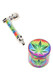 Rasta leaf design metal pipe with plastic sleeve and matching 1.5-in grinder, bright tie-dye; wholesale smoke-shop gift set. Rasta leaf design metal pipe with plastic sleeve and matching 1.5-in grinder, bright tie-dye; wholesale smoke-shop gift set.