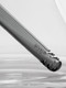 Close-up of a gray GRAV downstem with staggered diffusion slits inside a clear water pipe chamber.