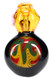 Close-up of 7-inch reverse rasta medallion on black-base hammer bubbler with amber chamber, detailed front view for head-shop retail Close-up of 7-inch reverse rasta medallion on black-base hammer bubbler with amber chamber, detailed front view for head-shop retail