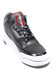 Wholesale sneaker herb grinder close-up, black and white shoe design with red tongue detail, angled view showing textured upper