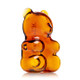 Side-back view amber gummy bear glass pipe with carb hole detail, compact counter item for smoke shops