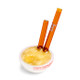 Top angle ramen bowl pipe highlighting textured noodle surface and two amber glass chopsticks, smoke shop restock