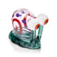 Angled Hemper snail hand pipe showing pink shell, red spiral, purple spots, and teal base