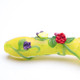 Handcrafted borosilicate glass garden-themed spoon pipe featuring detailed flower and nature accents
