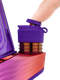 Close-up of Puffco 3DXL Chamber with purple Joystick Cap pressed by a fingertip on device