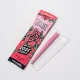 Opened Blazy Susan King Size Rose Cones pouch showing two pink pre-rolled rose-flavored cones in a protective plastic tray.