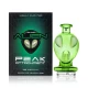 Hemper Alien Puffco Peak glass top displayed beside its branded retail box on white