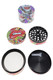 Lips design grinder opened to show pop-art lid, black grinding teeth, screen, collection chamber, and scraper
