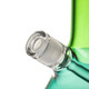 Close-up of clear ground glass connection on BigFun! Canopy bong against green and teal glass body