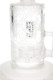 Close-up of frosted lotus artwork on the clear 6B Glass water pipe body, highlighting decorative head-shop glass detail.