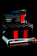 Eagle Torch gun lighters 15-count display in assorted translucent barrels, front angle on black—ideal for wholesale checkout counters.