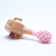 Peach body with pink clustered end and small looped accent, three-quarter view on white—B2B novelty hand pipe for showcases.