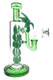 Side view of 6B Glass water pipe with layered green glass leaves and matching base for retail smoke gear displays.