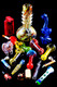 Example $75 Package Deal showing assorted glass and silicone pipes, water-pipe accessories, and grinders (SKU SPS120)