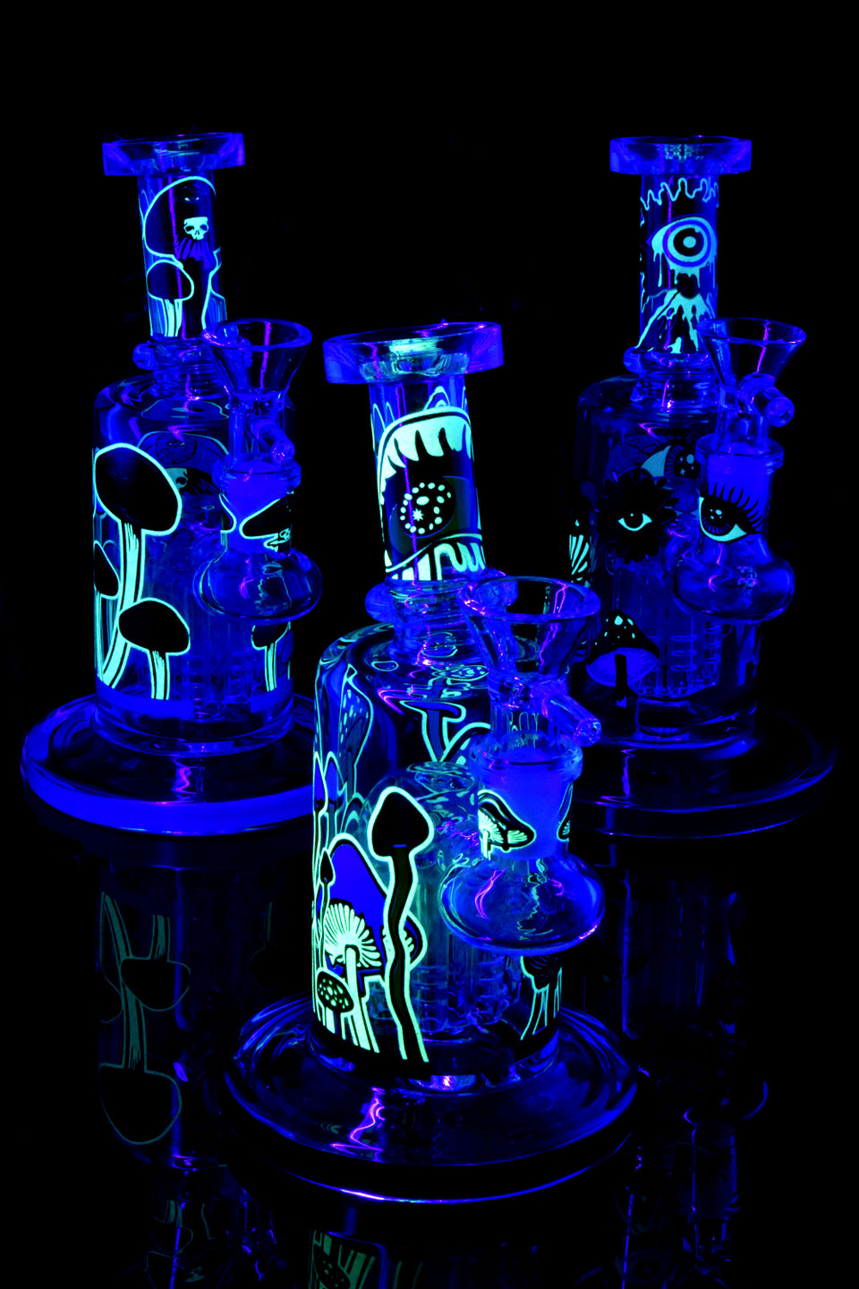 6.5 inch glow-in-the-dark mushroom GoG water pipe with tree perc, glass-on-glass head-shop bong style on white studio background.