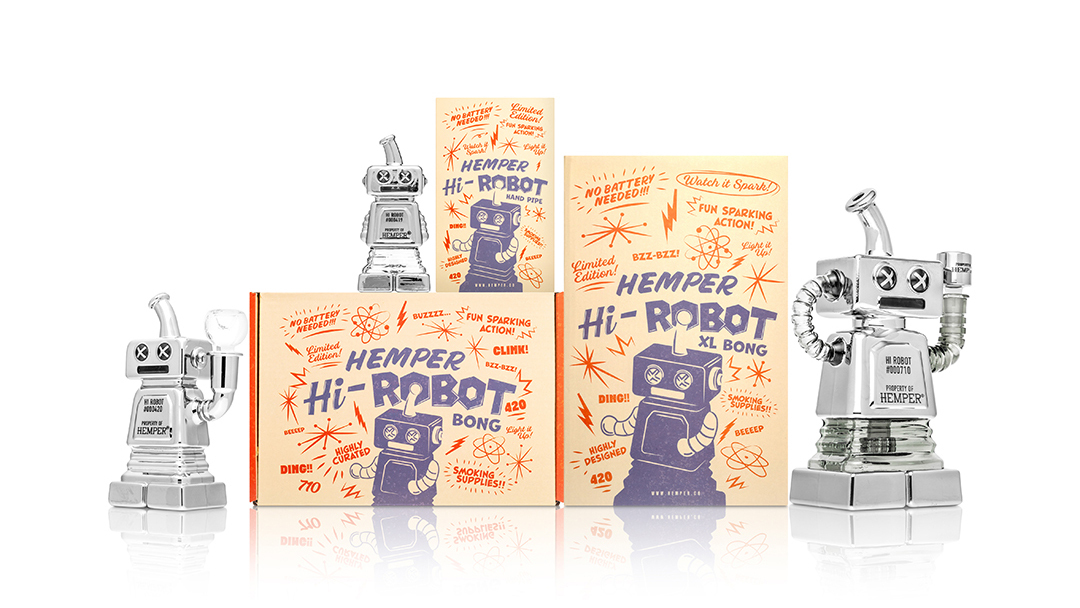 Hemper Hi-Robot chrome robot themed glass hand pipe, bong and XL recycler family with comic-style packaging