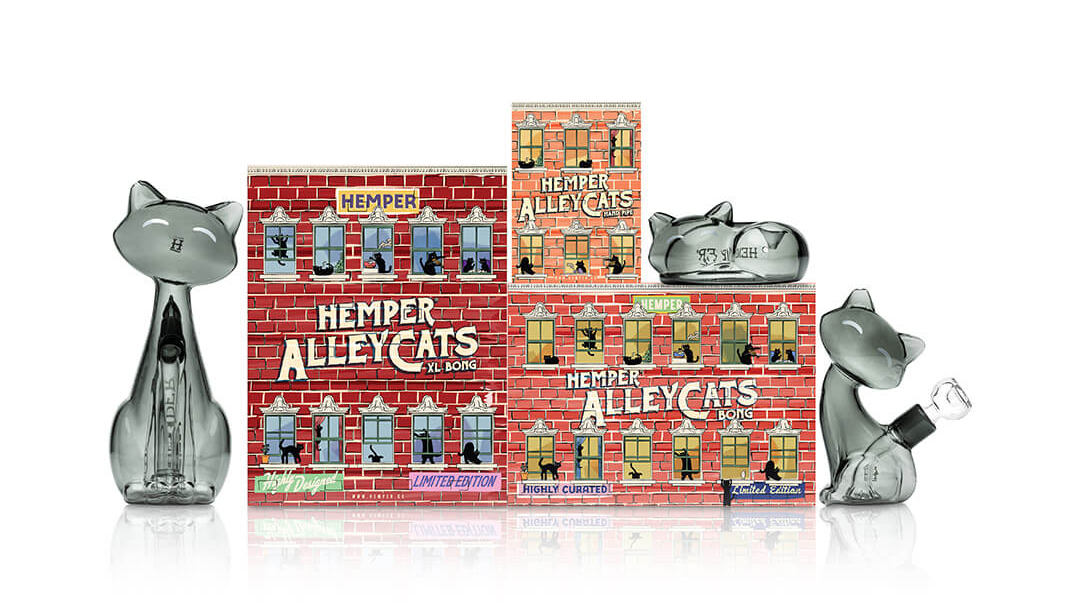 Hemper Alley Cats themed glass bong and hand pipe family group shot with brick packaging