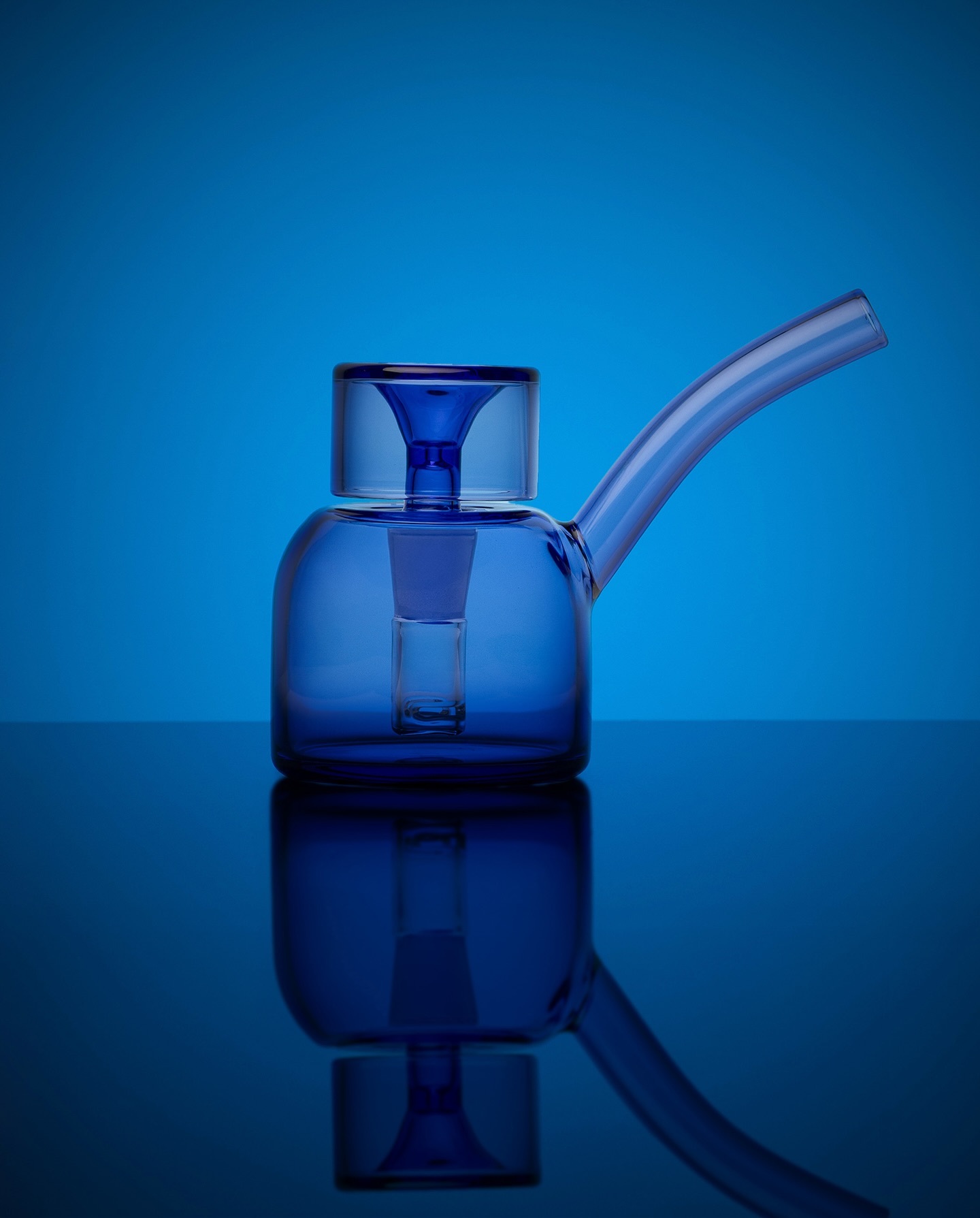 NWTN Home Vesper Bubbler in minimalist mid-century silhouette with compact borosilicate body for case displays