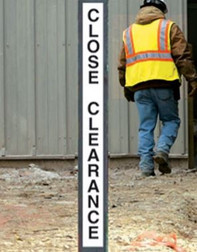 Aldon 4015-62 Vertical Safety Sign on a steel pole