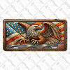 Bald Eagle license plate featuring soaring eagle with wings spread across American flag in rustic embossed-look copper and bronze design on aluminum.