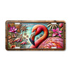 Flamingo license plate featuring embossed metal relief look artwork with pink flamingo, palm trees, and tropical florals.