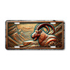 Mountain goat license plate featuring carved-wood style goat with curved horns and alpine mountain background in rustic bronze tones on aluminum.