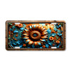 Rustic sunflower floral license plate featuring bold orange bloom with teal leaves and smaller blossoms in embossed-look artwork on aluminum.