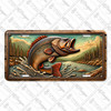 Rustic jumping bass license plate featuring a bold leaping fish with mountain lake background on aluminum.