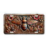 Rustic bee and flowers license plate featuring embossed-look copper design with honeybee and floral artwork on aluminum plate.