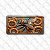 Rustic bumblebee and sunflower license plate featuring embossed-look copper design with bumblebee surrounded by sunflower blossoms on aluminum plate.
