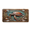 Rustic sea turtle license plate featuring embossed-look design with bronze turtle, shells, and teal ocean background.