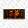 Pomeranian dog license plate featuring a fluffy copper-toned dog with embossed-look swirls and paw prints on a rustic aluminum background.