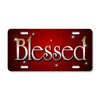 Blessed Text license plate featuring bold silver lettering with glowing highlights on radiant red background in embossed-look artwork on aluminum.