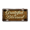 Grateful & Blessed license plate featuring ornate golden script lettering with scrollwork on rustic bronze background in embossed-look artwork on aluminum.