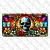 Stained glass skull license plate with radiant colors, butterflies, and flowers in rustic embossed-look artwork on aluminum.