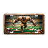 Eagle football mascot license plate featuring copper-toned eagle charging forward in rustic embossed-look artwork on stadium field.