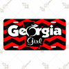 Georgia Girl license plate featuring red-and-black chevron background with white “Georgia” text, peach accent, and state silhouette with “Girl,” rustic embossed-look artwork on aluminum.